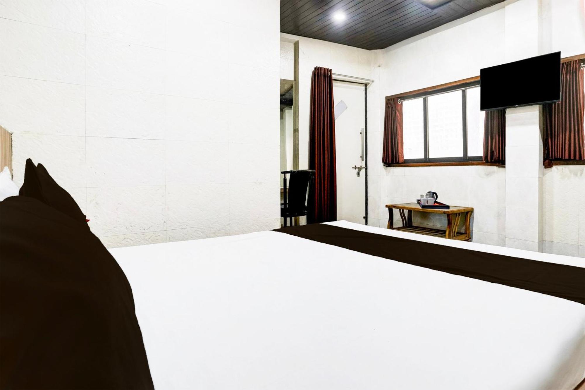 Super Hotel O Dombivali Formerly Pk Lodging Dombivli 外观 照片